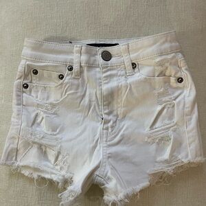 High waisted white ripped shorts